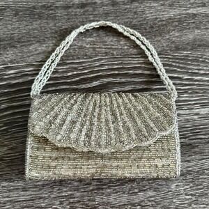 Gorgeous silver beaded clutch bag
